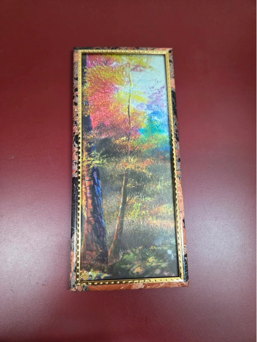 Vintage landscape artwork made with a specialized foil-backing technique